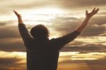 worship_man_lifts_hands